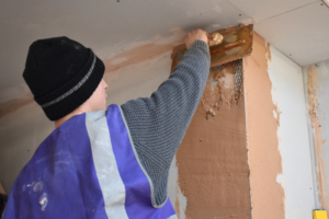 adult learner in plastering