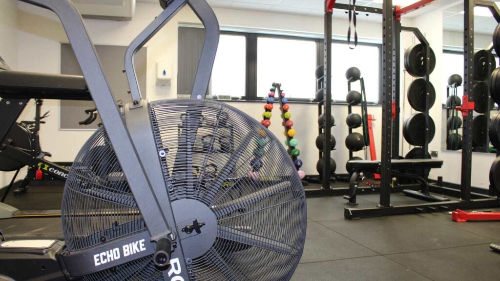 The air bike is at the front on the photo with the rest of the new gym equipment in the background.