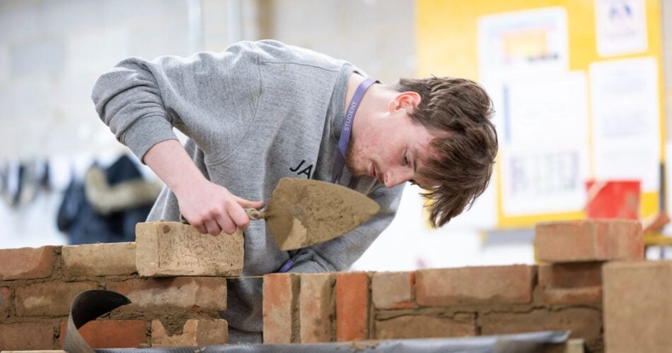 Bricklaying student in workshop at EKC Folkestone College