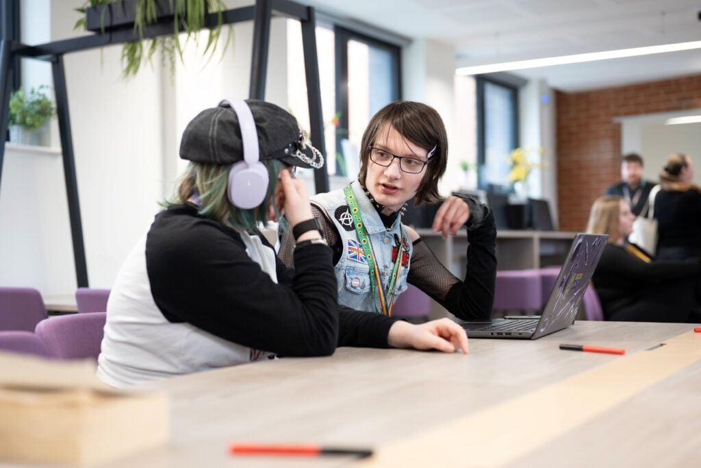 Students working on a laptop