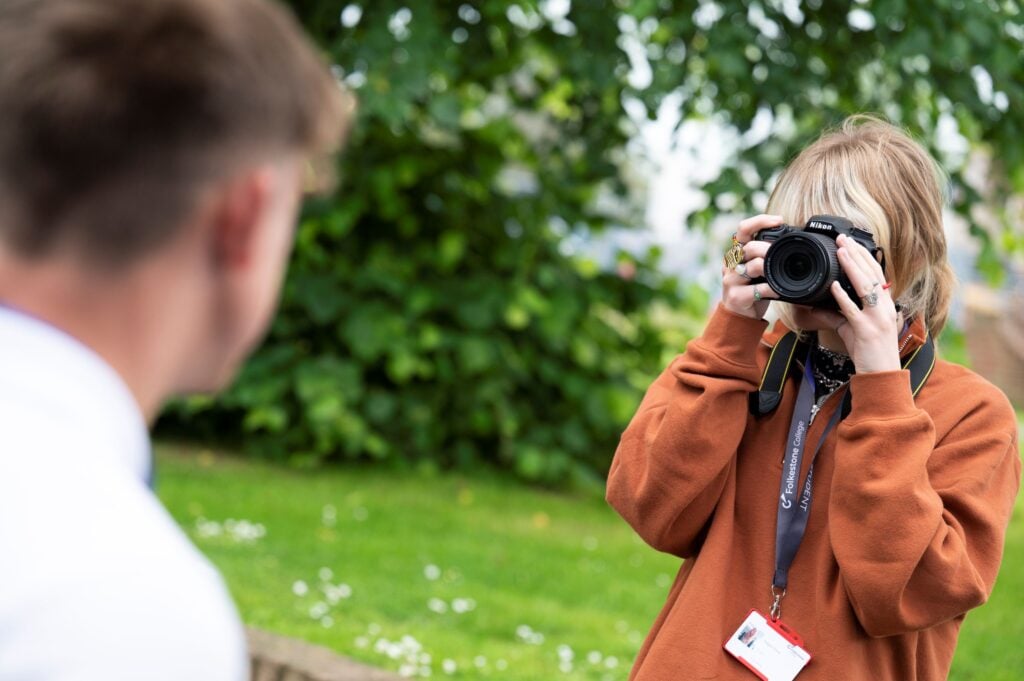 Female student taking a photo